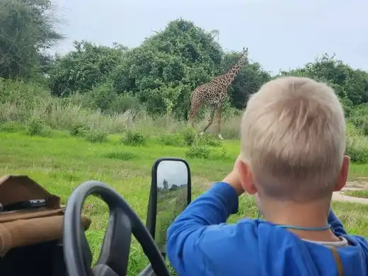 Family enjoying a Tanzania safari in Serengeti National Park