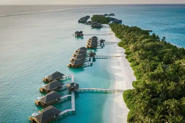 White-sand beach and turquoise waters at a luxury Zanzibar beach resort.